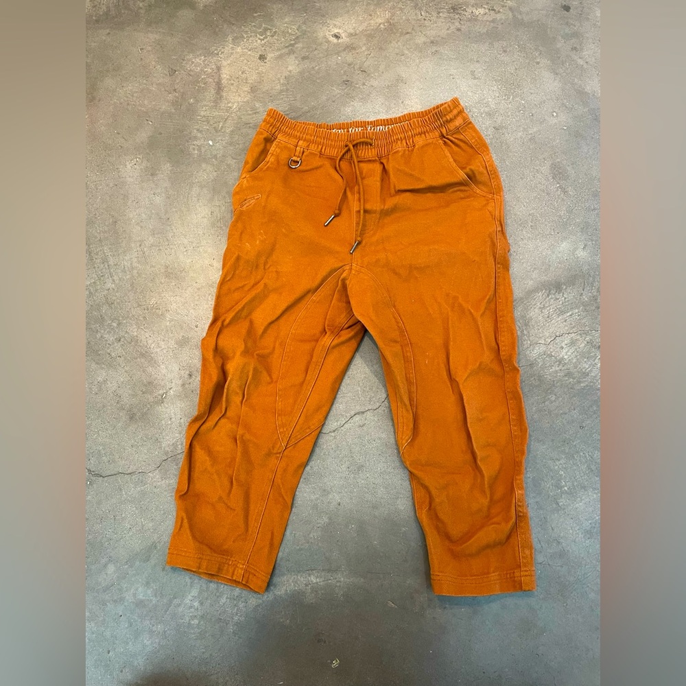 Brown, drop-crotch capri cotton drawstring “joggers.”